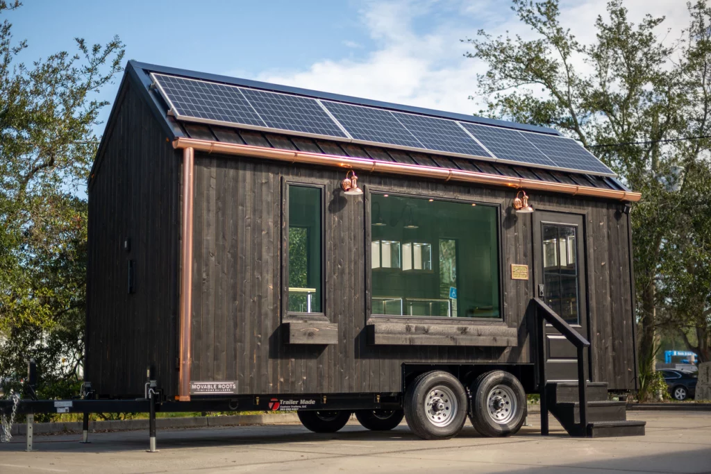 Photo of exterior of the "Jeweled Barn," an upscale jewelry store built in a mobile "tiny house."